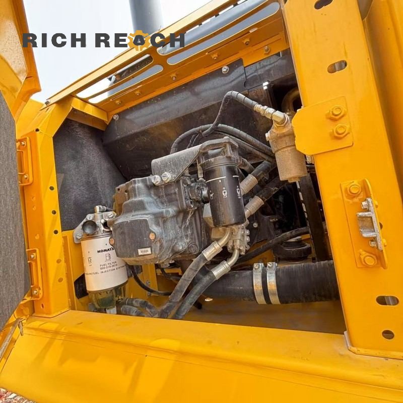 Undercarriage and tracks of a 2018 Komatsu PC240LC excavator, priced at $34,722